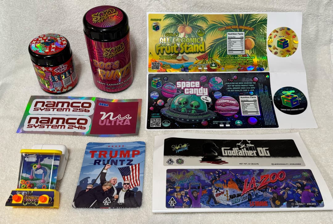 Spread of finished cannabis brand labels and packaging produced through Slap Hub
