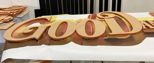 Raw production, making of Gray Man signage