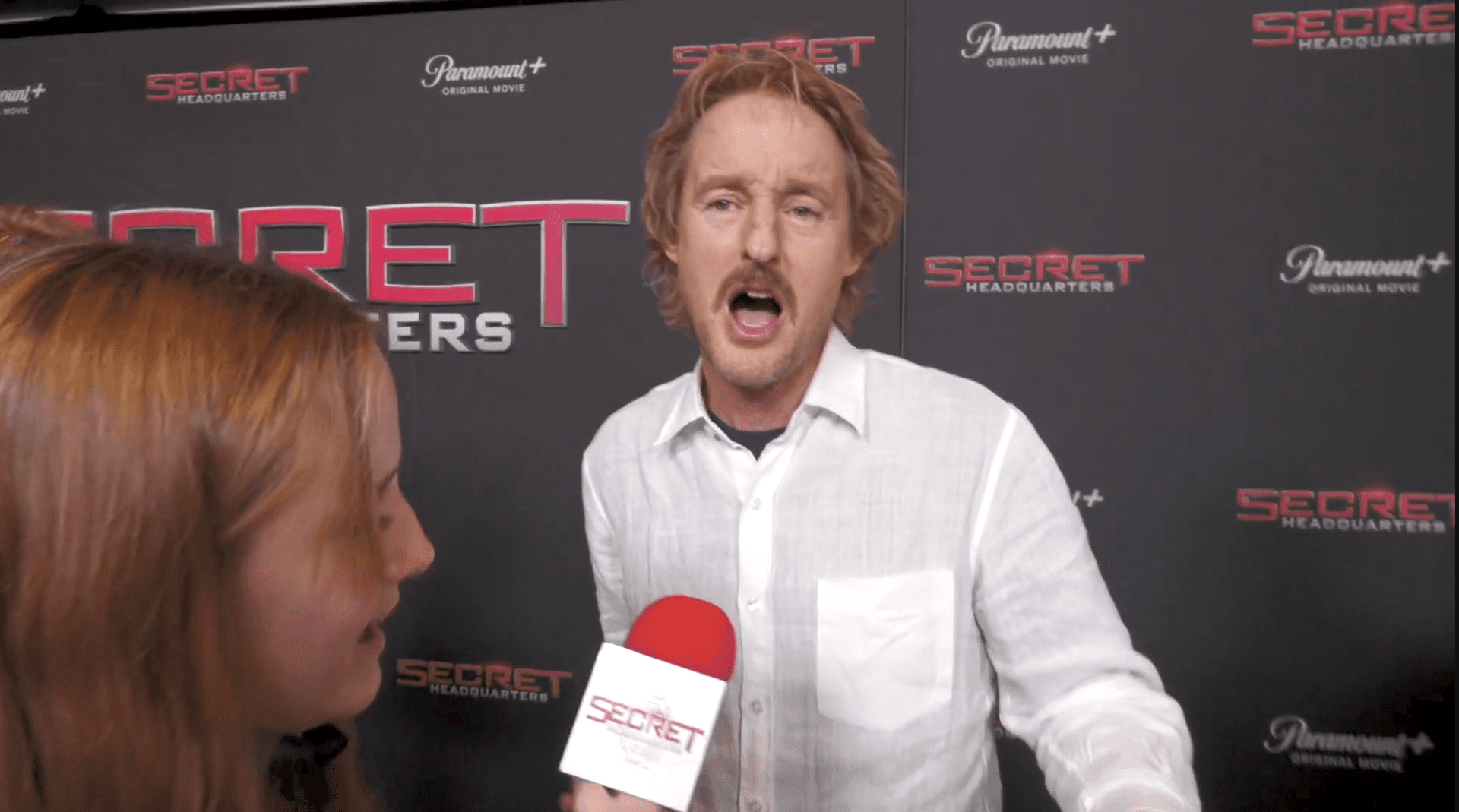 Secret Headquarters interview wall in use at the premiere